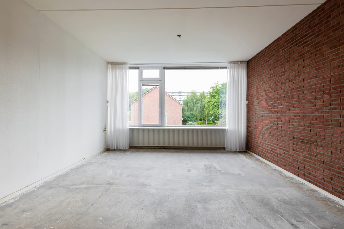 Tussenwoning te koop: Topaasstraat 17, Groningen
