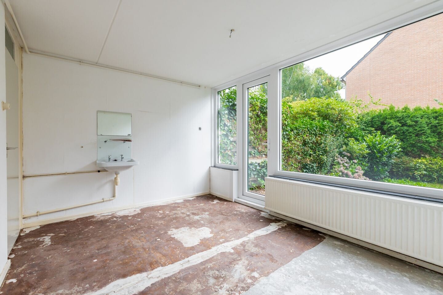 Tussenwoning te koop: Topaasstraat 17, Groningen