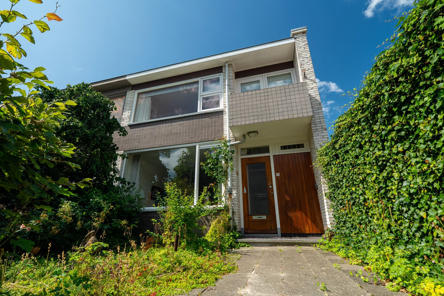 Tussenwoning te koop: Hubertushof 15, Haren Gn