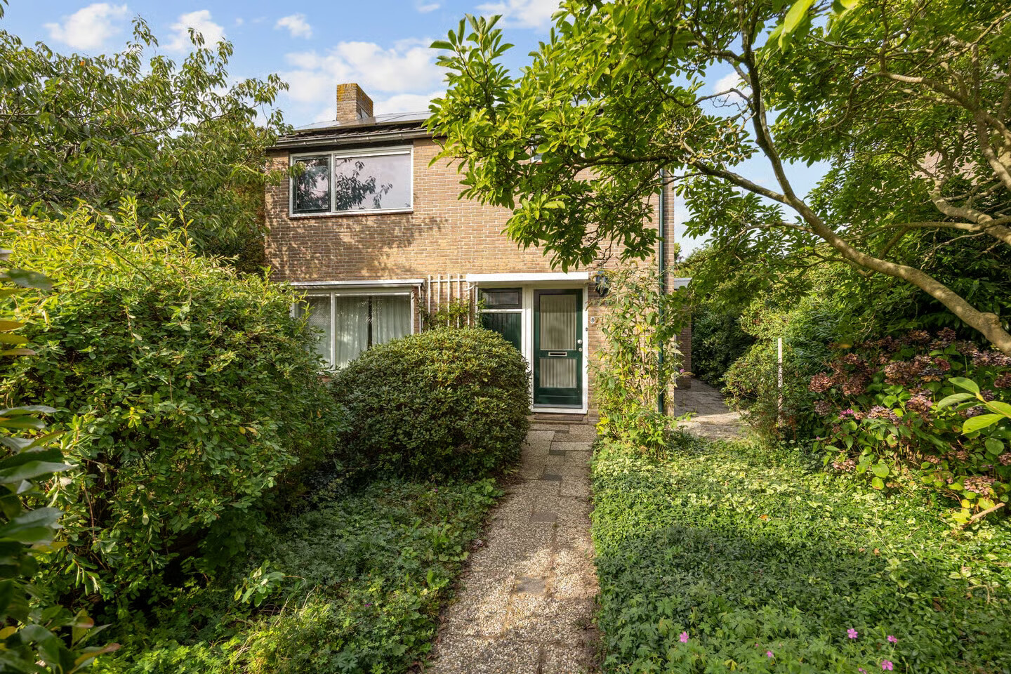 Vrijstaande woning te koop: Meidoornlaan 8, Sauwerd