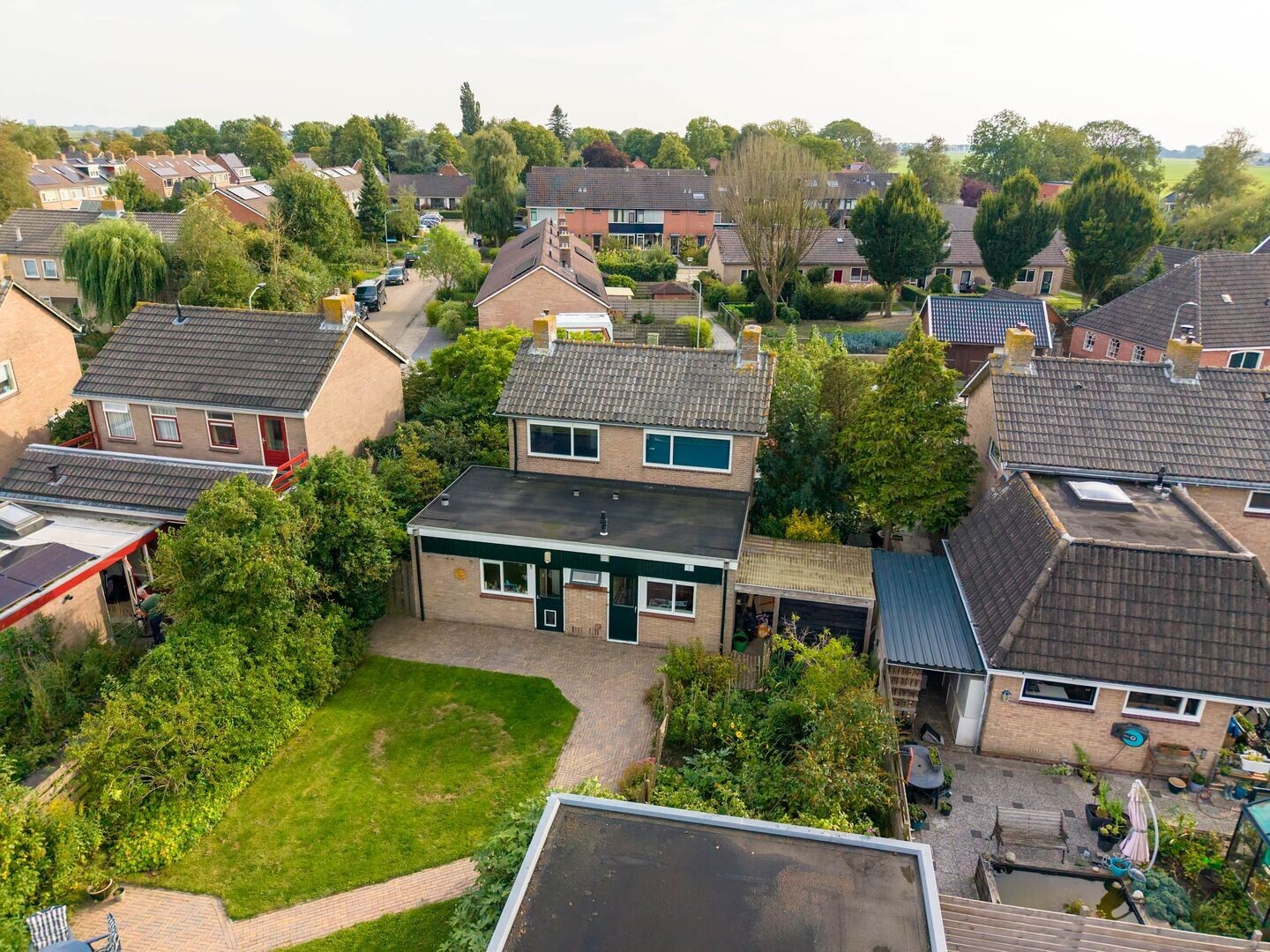 Vrijstaande woning te koop: Meidoornlaan 8, Sauwerd