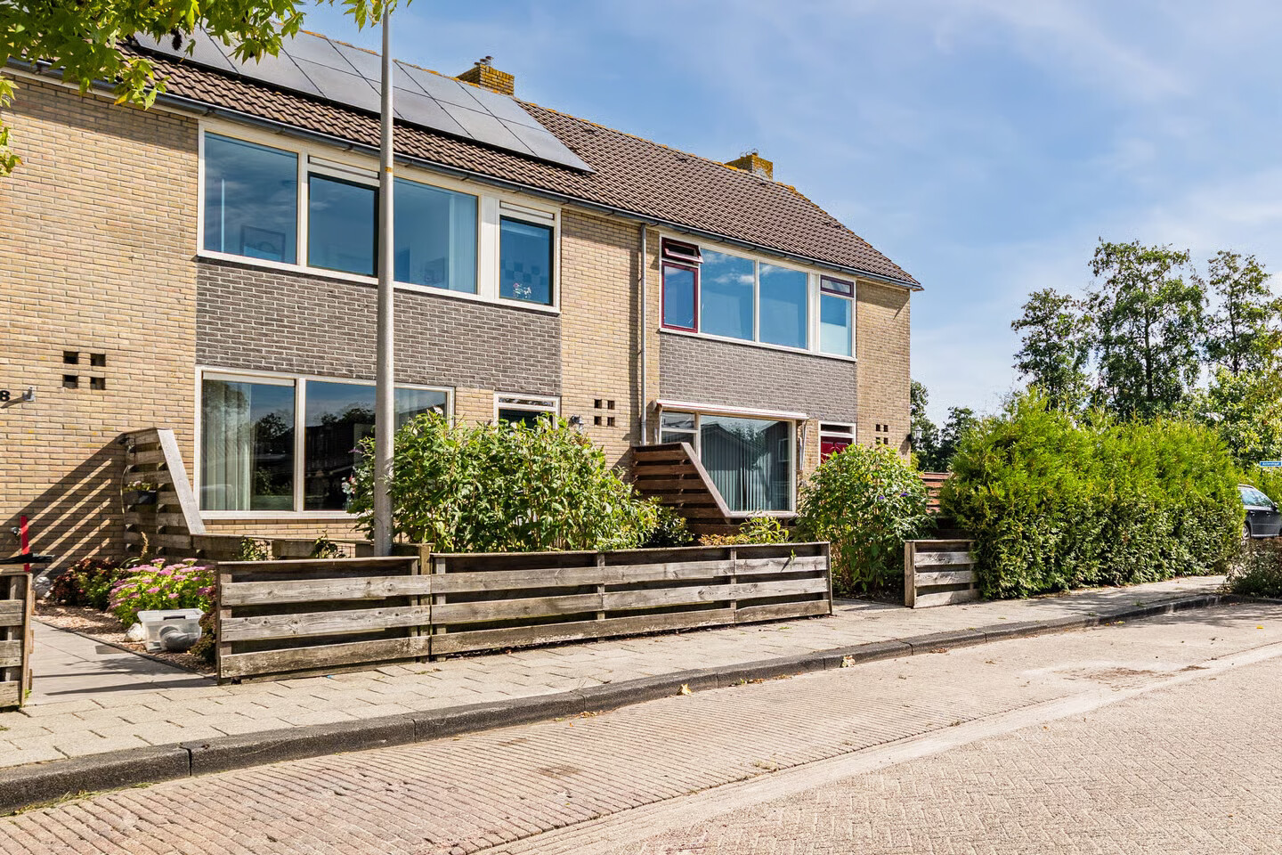 Tussenwoning te koop: Kerkstraat 6, Munnekezijl