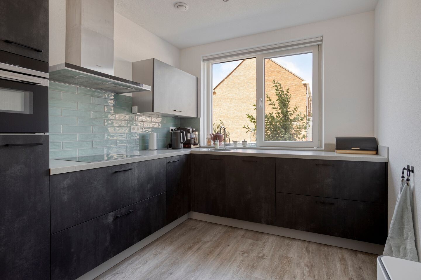 Tussenwoning te koop: Burgemeester de Sitterstraat 9, Appingedam