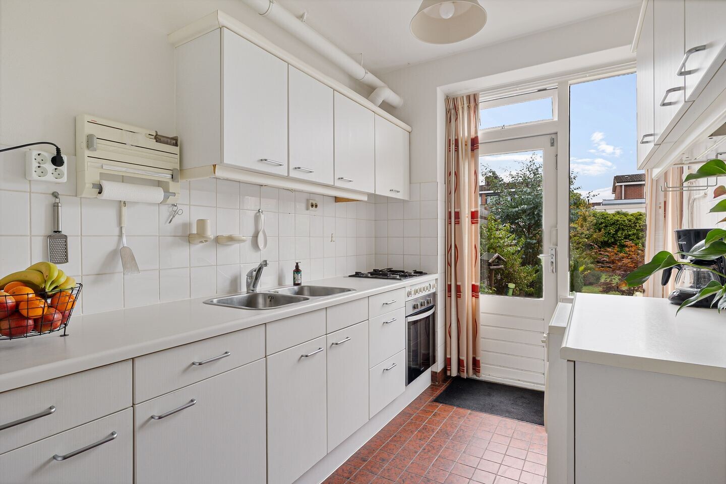 Tussenwoning te koop: Grachtstraat 10, Winsum