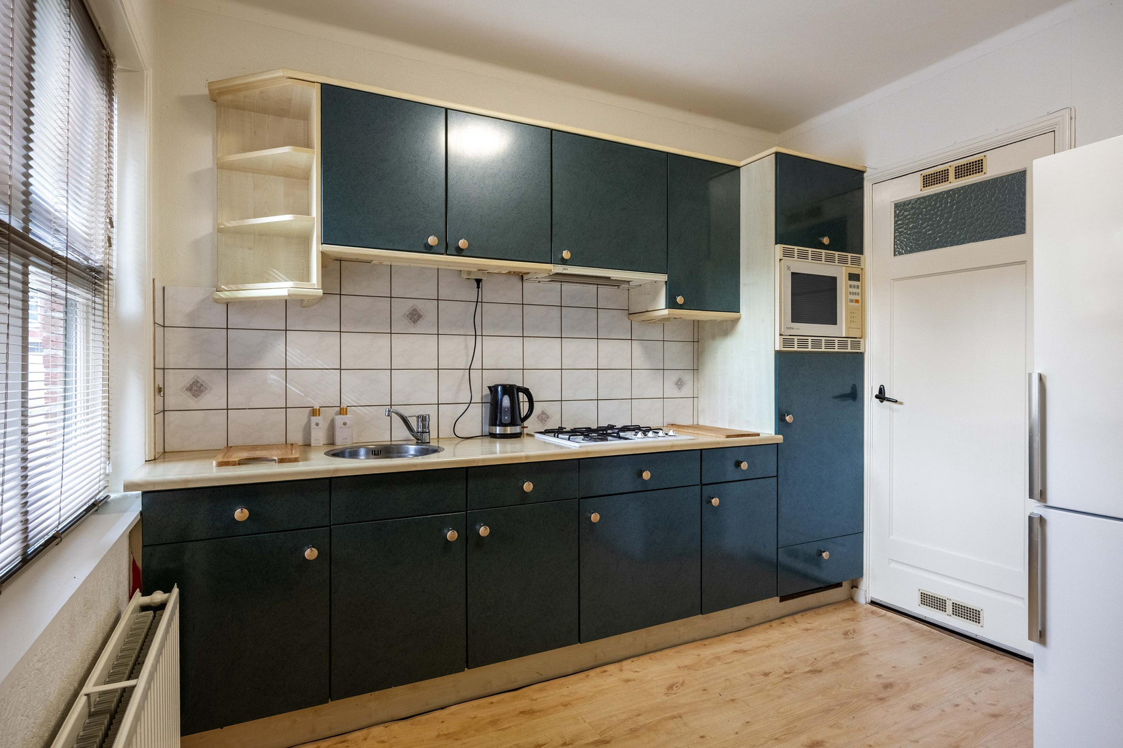 Twee-onder-één-kap te koop: Oosterstationsstraat 25, Uithuizen