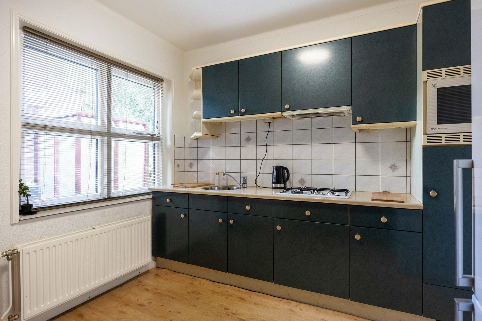 Twee-onder-één-kap te koop: Oosterstationsstraat 25, Uithuizen