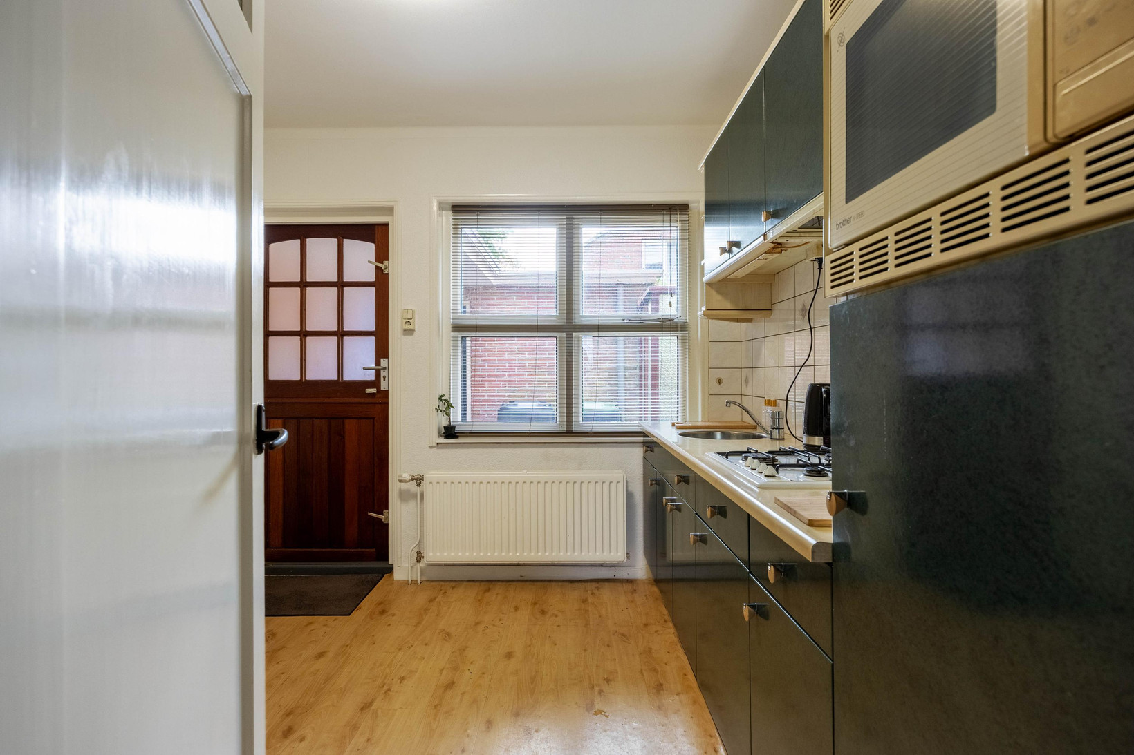 Twee-onder-één-kap te koop: Oosterstationsstraat 25, Uithuizen
