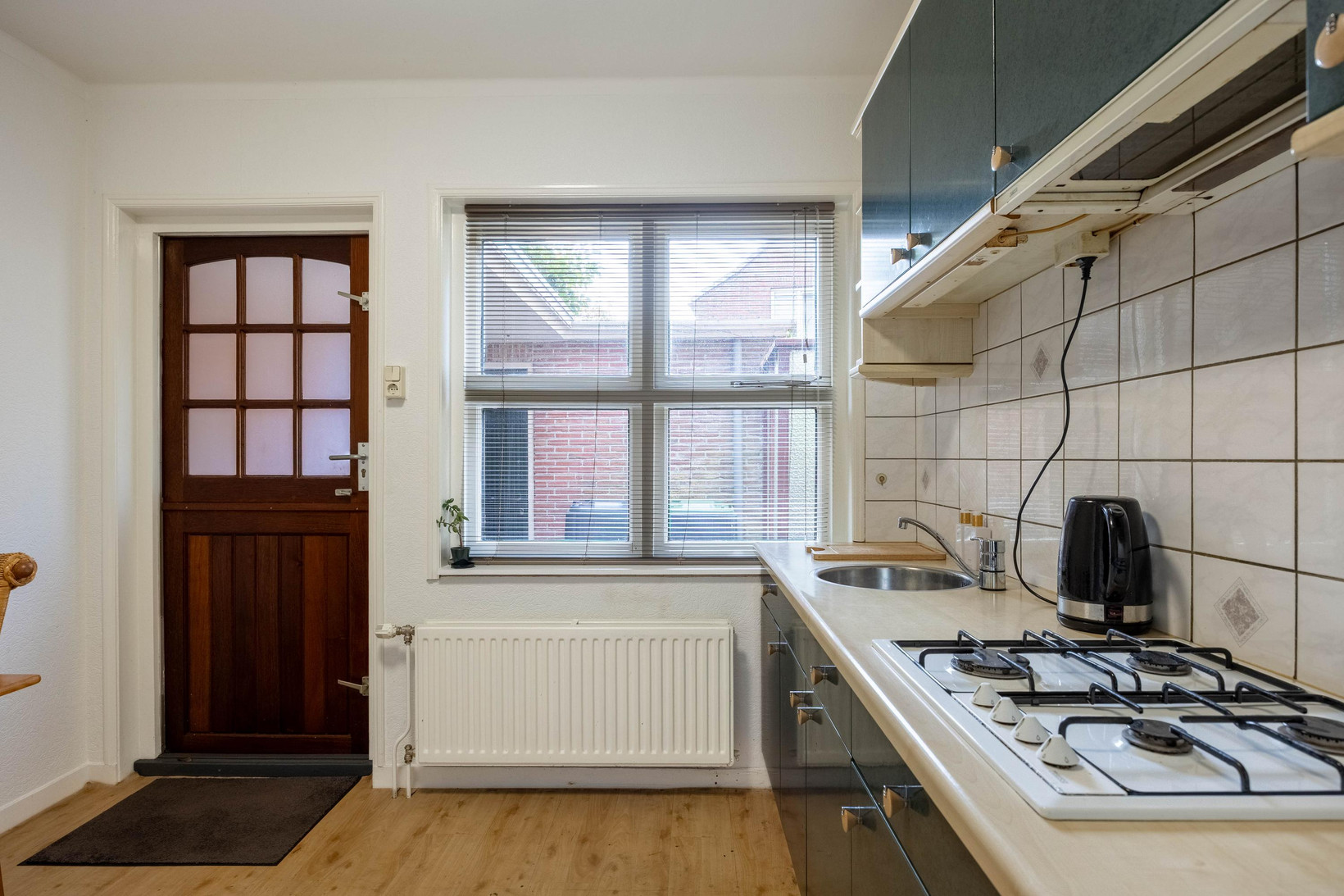 Twee-onder-één-kap te koop: Oosterstationsstraat 25, Uithuizen