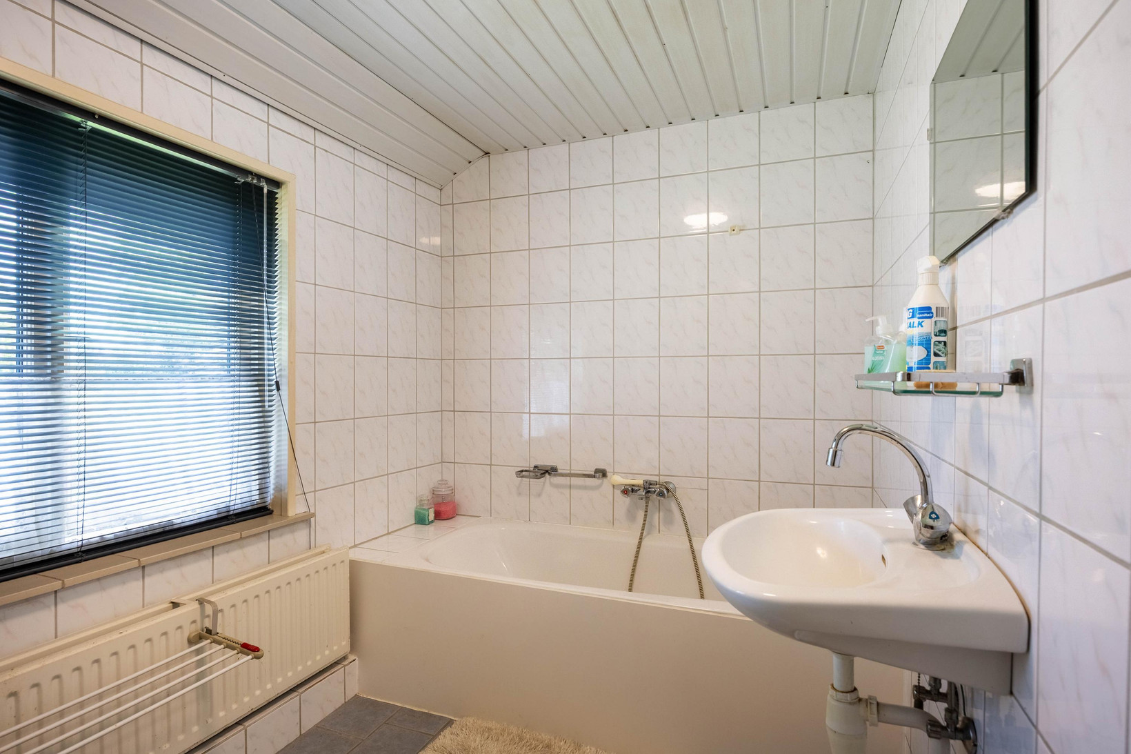 Twee-onder-één-kap te koop: Oosterstationsstraat 25, Uithuizen